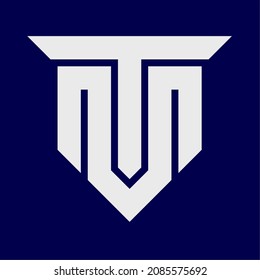 Monogramm-Logo der Buchstaben T und M, die eine Schutzschild bilden. modernes, elegantes und luxuriöses Logo.
