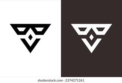 monogram logo in the shape of an inverted triangle that forms the face of a robot or alien. black and white background.