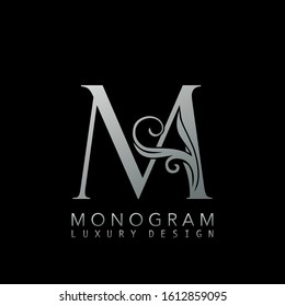 Monogram Luxury M Logo Letter. Simple luxuries vector design concept abstract nature floral leaves  with letter logo icon silver color.