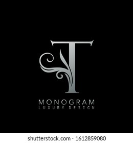 Monogram Luxury T Logo Letter. Simple luxuries vector design concept abstract nature floral leaves  with letter logo icon silver color.