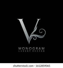 Monogram Luxury V Logo Letter. Simple luxuries vector design concept abstract nature floral leaves  with letter logo icon silver color.