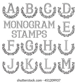 Monogram stamps set. Letters from A to M in semicircular floral frames.