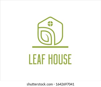 monogrammed house with green leaf logo design