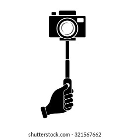 Monopod camera with hand vector icon.