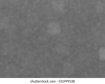 Monotone spotted surface. Abstract grey background, vector EPS10. Not trace image, include mesh gradient only
