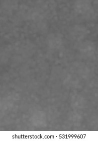 Monotone spotted surface. Abstract grey background, vector EPS10. Not trace image, include mesh gradient only