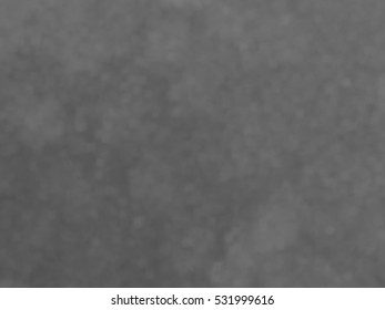 Monotone spotted surface. Abstract grey background, vector EPS10. Not trace image, include mesh gradient only