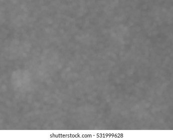 Monotone spotted surface. Abstract grey background, vector EPS10. Not trace image, include mesh gradient only