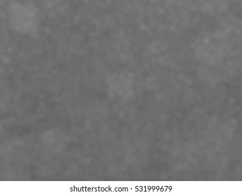 Monotone spotted surface. Abstract grey background, vector EPS10. Not trace image, include mesh gradient only