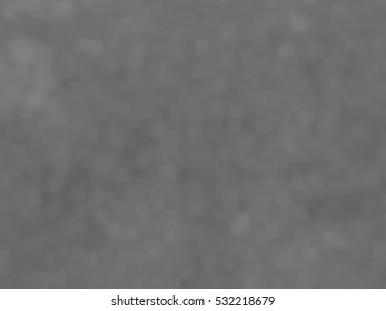 Monotone spotted surface. Abstract grey background, vector EPS10. Not trace image, include mesh gradient only