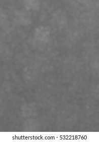 Monotone spotted surface. Abstract grey background, vector EPS10. Not trace image, include mesh gradient only