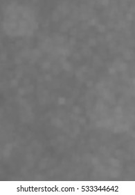 Monotone spotted surface. Abstract grey background, vector EPS10. Not trace image, include mesh gradient only
