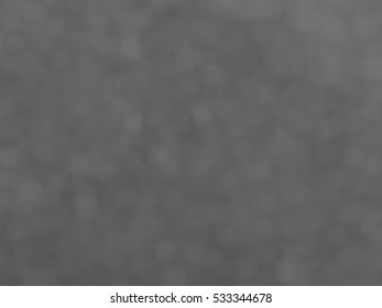 Monotone spotted surface. Abstract grey background, vector EPS10. Not trace image, include mesh gradient only