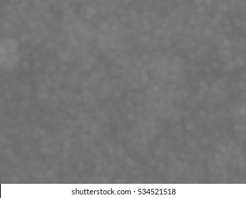 Monotone spotted surface. Abstract grey background, vector EPS10. Not trace image, include mesh gradient only