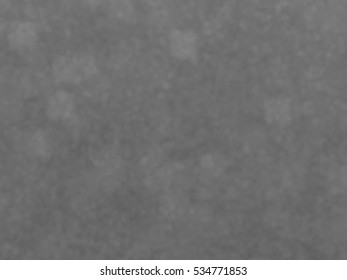 Monotone spotted surface. Abstract grey background, vector EPS10. Not trace image, include mesh gradient only