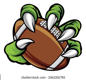 A monster or animal claw holding an American football ball