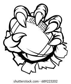 A monster or animal claw holding an American football ball and breaking through the background