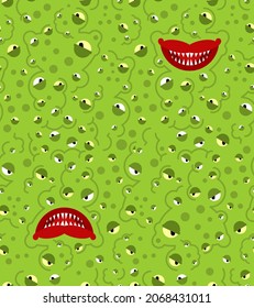 Monster face pattern seamless. Teeth and jaws of green monstrosity background
