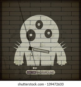 Monster on old brick wall