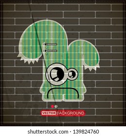 Monster on old brick wall