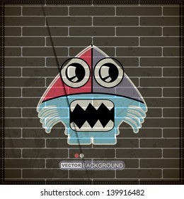Monster on old brick wall