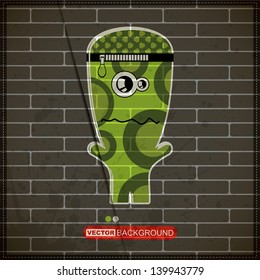 Monster on old brick wall
