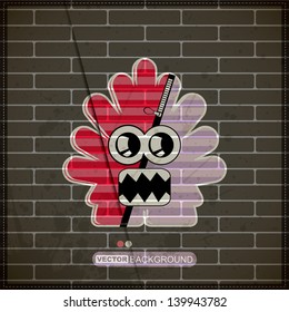 Monster on old brick wall