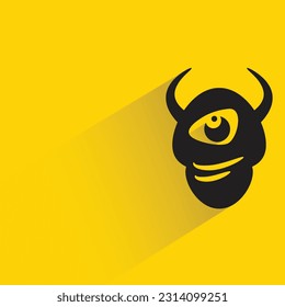 monster with shadow on yellow background