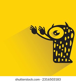 monster with shadow on yellow background