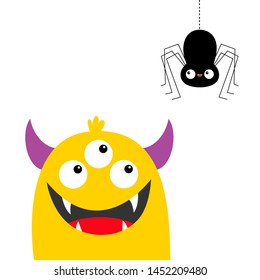 Monster yellow head looking at hanging black spider. Three eyes, teeth fang, horns, hands up. Cute kawaii cartoon funny baby character. Happy Halloween Flat design White background Vector illustration