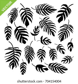 Monstera leaves silhouettes vector