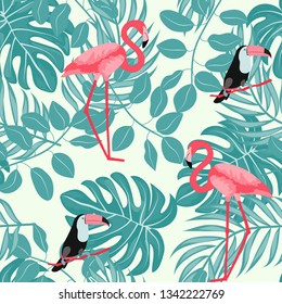 Monstera, pink flamingo and toucan seamless pattern. Tropical birds. Summer floral background with tropical plants for swimwear textile, covers, wallpaper, paper. Flamingos,toucan and a parrot.