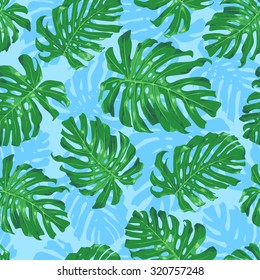 Monstera. Tropical leaves seamless vector pattern on a blue background. 