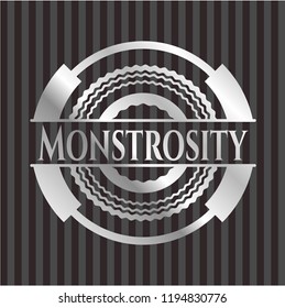 Monstrosity silver emblem or badge