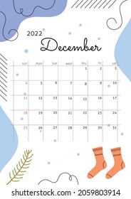 Monat Dezember 2022 mit abstrakten Elementen, Linien, Socken, Schnee und Tannenarm. Vertikal gemütliches Poster mit gemütlicher Atmosphäre. Vektorgrafik. Kalendergitter mit Quadraten für Einträge