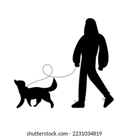 Month of dog walking. Silhouette of a woman walking with a dog 