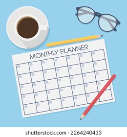 Monthly planner on the table, top view