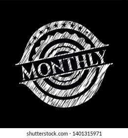 Monthly written on a chalkboard. Vector Illustration. Detailed.