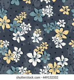 Moody floral pattern with teal, white and yellow blossoms on a dark navy background with subtle dots. Perfect for fabric, wallpaper, stationery and packaging designs.