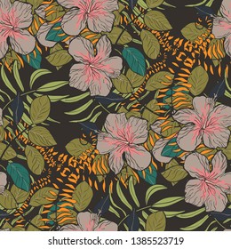 Moody floral tropical pattern design with hibiscus flowers and leaves on dark background. Exotic seamless pattern with tropical leaves. Ethnic Background with Hawaiian flowers and plants.