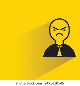 moody man with shadow on yellow background