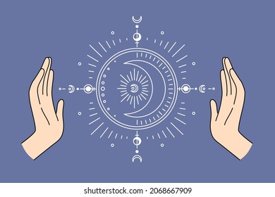 Moon astrology sign system concept. Human hands and moon oriental signs system between them over blue background vector illustration