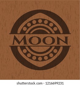 Moon badge with wooden background