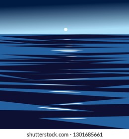 moon in the blue sky over the dark ocean