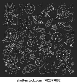 Moon surface. Kindergarten children play space exploration. Alien, ufo, spaceship. rocket. Children, boys and girls with moon, mars, saturn, jupiter
