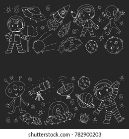 Moon surface. Kindergarten children play space exploration. Alien, ufo, spaceship. rocket. Children, boys and girls with moon, mars, saturn, jupiter