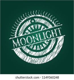 Moonlight chalkboard emblem written on a blackboard