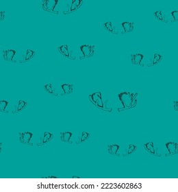 A moose antlers on a green background. seamless patterns.