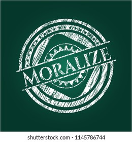 Moralize chalk emblem written on a blackboard