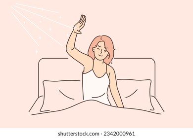 Morning awakening of woman dissatisfied with sun rays that interfere with sleep in bed. Girl sleeping in bed in bedroom wakes up due to bright sun and lack of curtains blocking sunlight